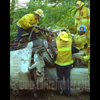 photograph of car atop car