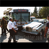 photograph of bus vs. rolls royce.
