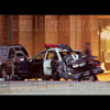 photograph of wrecked police car