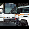 photograph of a bus head on into a bus