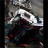 A big rig jacknifed and flipped on its side