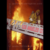 photograph of firefighter down a ladder