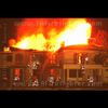 photograph of mansion on fire