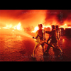 photograph of firefighters at rubber yard