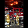 photograph of firefighter taking oxygen